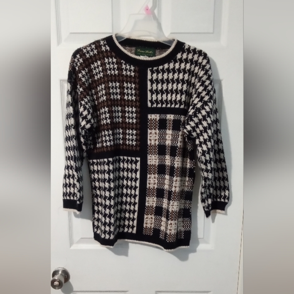 Black and White Crew Neck Sweater with Geometric Patterns